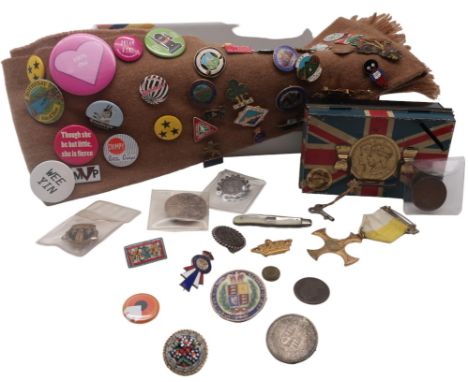 A collection of Victorian silver coins mounted as brooches, two micro-mosaic brooches, a mother of pearl-handled Sheffield si