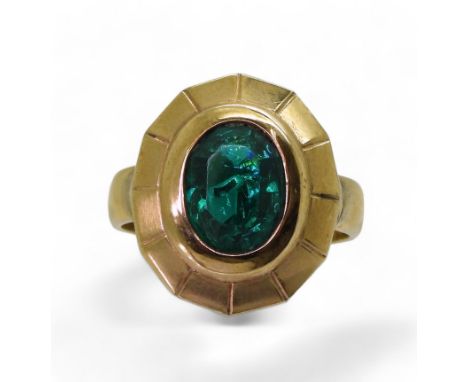 A green gem ring, this ring has had a 18ct gold shank soldered onto the 9ct gold head, both elements are hallmarked and set w