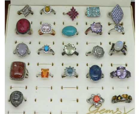 Twenty one silver gem set rings to include, two diamond flower cluster rings, an Italian designer checkerboard cut amethyst r