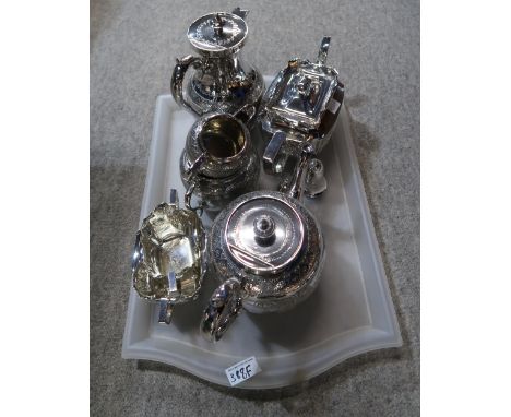 A three piece EPNS tea service, of spherical form, engraved with geometric banding, with a presentation marriage inscription,