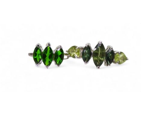 A 9ct white gold Russian diopside three stone ring, size N1/2, together with a 9ct white gold mixed green gemstone ring, size