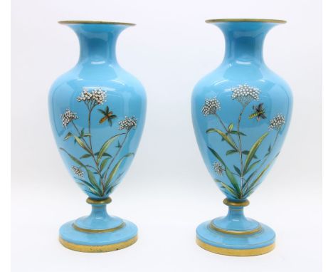 A pair of Victorian turquoise glass vases with enamel flower and dragonfly decoration, 43cm high