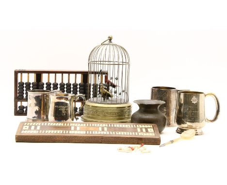 A late 19th/early 20th century automaton singing bird cage, 27cm high, together with a 19th cribbage board, an abacus, silver