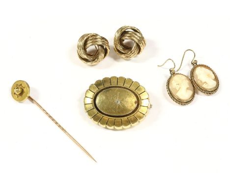 A collection of gold jewellery, to include a Victorian single stone star set diamond brooch, to a raised boss, rope and petal