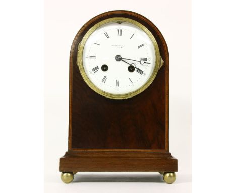 An Edwardian strung mahogany mantel clock, the enamel dial inscribed Mappin &amp; Webb Ltd, London, supporting a drum movemen