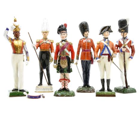 Two Sitzendorf soldiers ‘The Black Watch’ and ‘Third Regiment Grenadier Guards’, together with four similar capodimonte examp