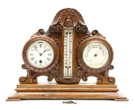 A Victorian carved oak mantel clock/barometer, dial inscribed 'B W Fraser, Grantown-on-Spey', 31cm high