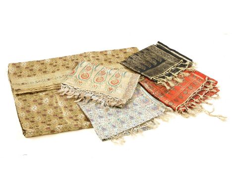 A collection of vintage saris, and woven Indian fabric shawlsProvenance: From the estate of the late Henry Wilson
