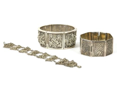 A silver filigree butterfly bracelet, each one joined by jump rings (damaged), and an Indian silver panel bracelet, each pane