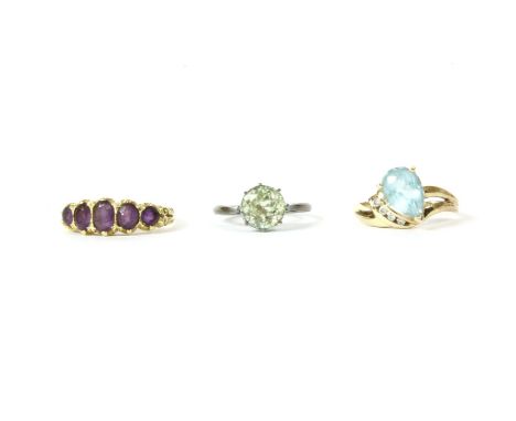 An 18ct gold five stone graduated oval cut amethyst ring, 4.83g, size M, and a gold pear shaped topaz, diamond cluster to a p