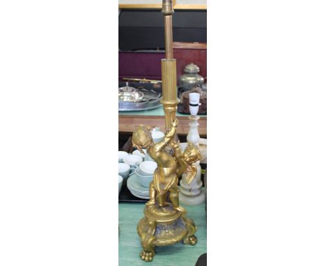 A gilt metal cherub table lamp plus two others