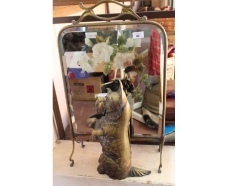 A brass dog companion set plus a mirrored fire screen