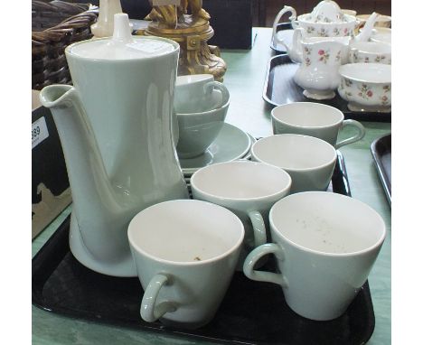 Two brass oil lamps, a stoneware foot warmer plus a Poole coffee set (two trays)