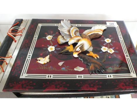 A Japanese lacquer and mother of pearl photo album