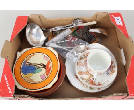 A silver plated ladle, 1901 Coronation trio, Clarice Cliff plate, two silver spoons etc