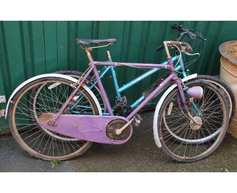 An Apollo bicycle and vintage lady's bicycle