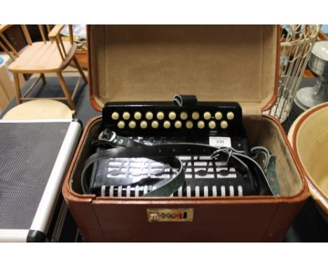 A Chanson accordion in carrying case