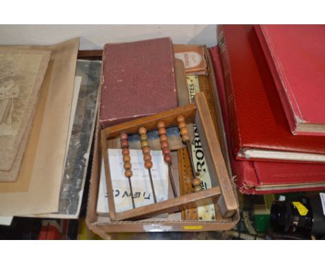 A box containing playing cards; a cribbage board; an abacus etc.