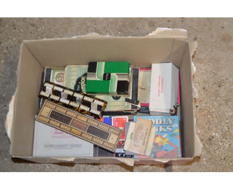 A tortoiseshell and mother of pearl cribbage board together with various games, playing cards etc. 