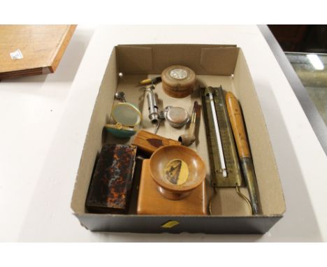 A Mauchlineware box depicting Aldeburgh Beach; a papier mach&eacute; snuff box; one other snuff box; a whistle; brass cased t