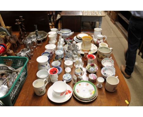 A continental porcelain figure group; various china hand bells; a Pin Mill barge match commemorative mug; and various other d