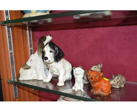 Three Poole pottery mice; a Goebel cub; and three various dog ornaments 