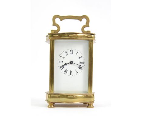 Brass carriage clock the white enamel dial with Roman numerals H 16cm