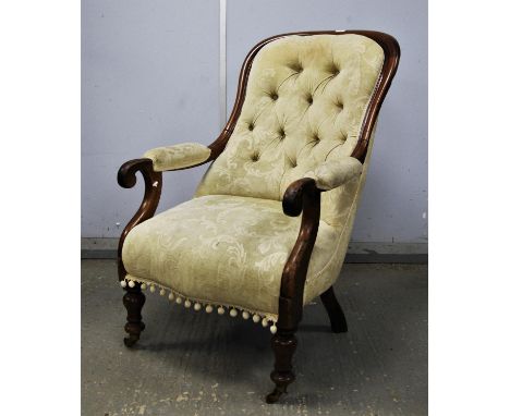 Victorian mahogany spoon armchair, upholstered down swept arms, button back upholstery, overstuffed seat, on turned legs, bra