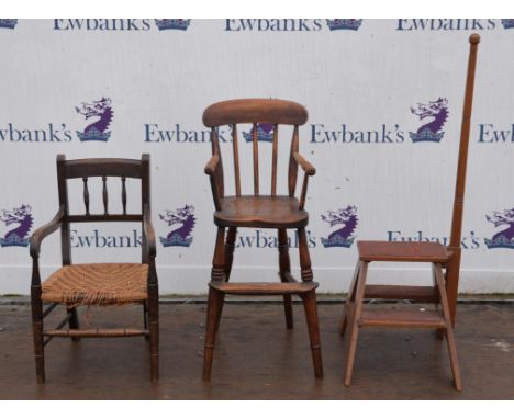 Childs beech and elm stick back high chair, another childs chair with rush seat and a set of library steps