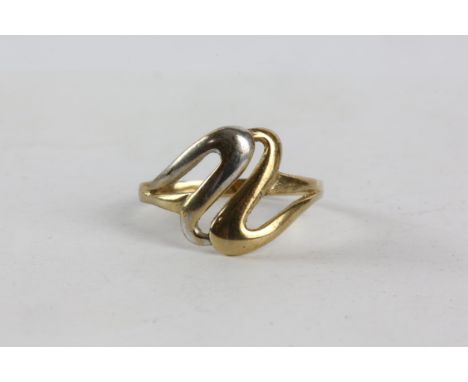 Bicolour gold swirl pattern ring, stamped 9ct, ring size R, 1.8 grams