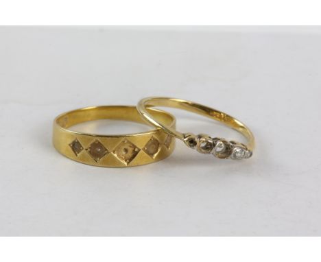 Two stamped 18ct rings, sizes N and M, 3.4 gramsCondition Report:  stones missing from both rings