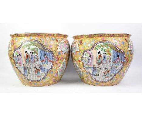 Pair of Chinese porcelain jardinieres/ or fish bowls, Modern, decorated with panels of ladies in architectural scenes, 31cm h