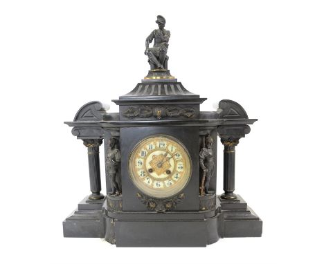 Late victorian black slate mantel clock mounted with three knights flanked by two columns