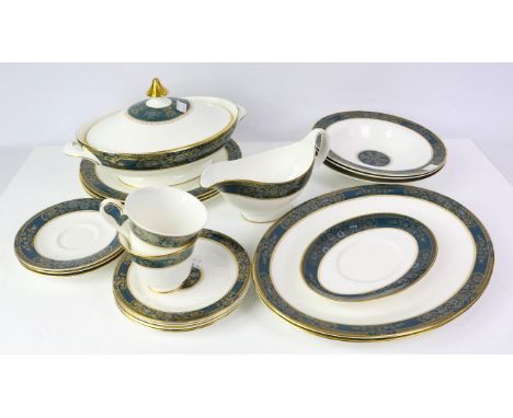 A Royal Doulton Carlyle pattern part dinner service consisting of three large oval dishes, sixteen dinner plates,eight smalle