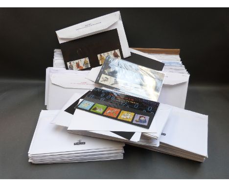 A large quantity of presentation packs and first day covers in envelopes 