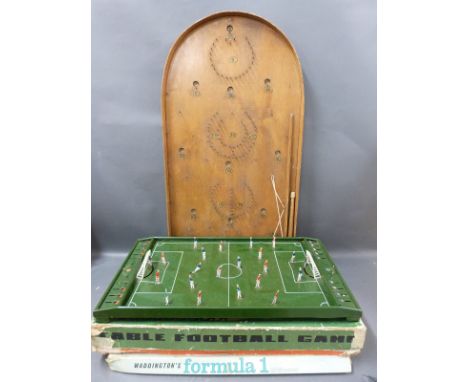 An early tinplate table football game in original box, Waddington Formula 1 game and bagatelle board.