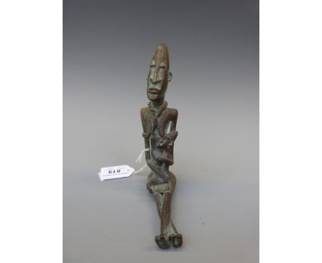 An African bronze/brass figure of a seated mother and child, height 17cm 