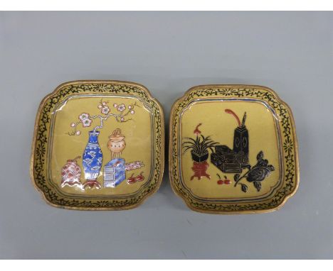 A pair of 19thC Chinese enamel dishes one with scholars attributes decoration, the other vases and vessels.