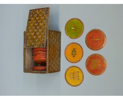 Seventy six circular 18thC/19thC Persian playing cards in a period lacquer box