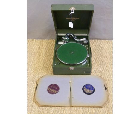 Columbia portable "picnic" type wind up gramophone in green Rexine case together with a few contemporary shellac records in D