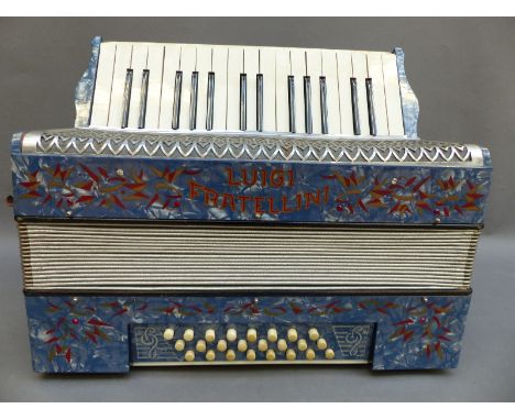 Luigi Fratellini 24 brass piano accordion in light blue pearloid finish with diamanté decoration with original case