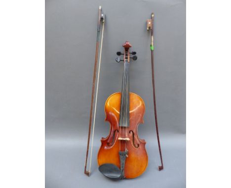 A late 20thC violin with 35.5cm two piece back labelled Antonius Stradivarius Cremonensis made in Czechoslavakia, with case a
