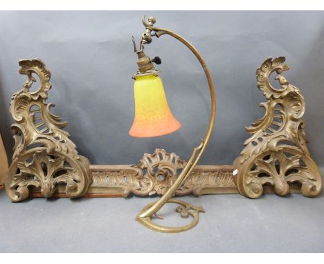 A brass fire fender and a vintage brass lamp with glass shade by Muller Fres Luneville