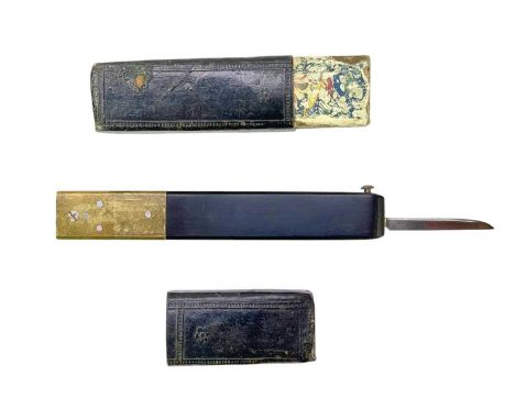 A Victorian brass and ebony quill cutter. Stamped 'Rogers cutler to her Majesty', with a retracting blade, also signed, in a 