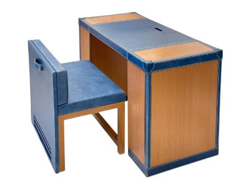 Superyacht furnishings, a blue leather space-saving desk with a matching upholstered chair.  A contemporary design of colourf
