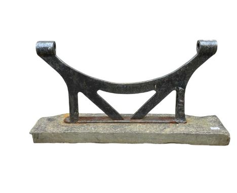 A large roller brush foot scraper. Formed of cast iron on a rustic slate base, height 30cm, width 60cm, depth 18cm.