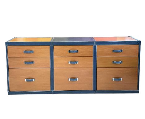 Superyacht furnishings, a blue leather bank of nine-drawers  Wood veneer front, two small drawers above a deep drawer, with w