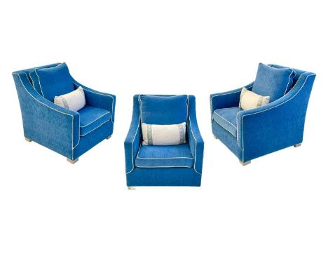 Superyacht furnishings, three contemporary blue velour armchairs.  With gently sloping arms and chrome feet, contrasting whit