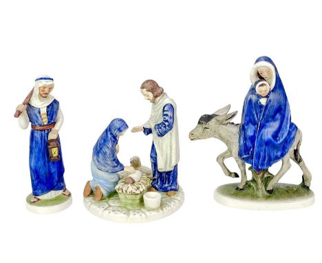 Two Goebel figures and a Goebel candle holder. A 'Flight from Egypt' figure of Mary and Jesus, height 18cm, designed by Janet