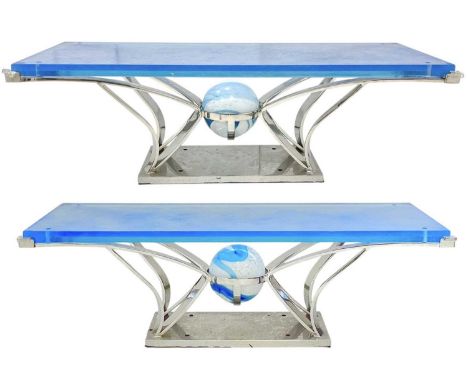 Superyacht furnishings, a pair of contemporary chrome and blue glass coffee tables.  These stylish tables have abstract chrom